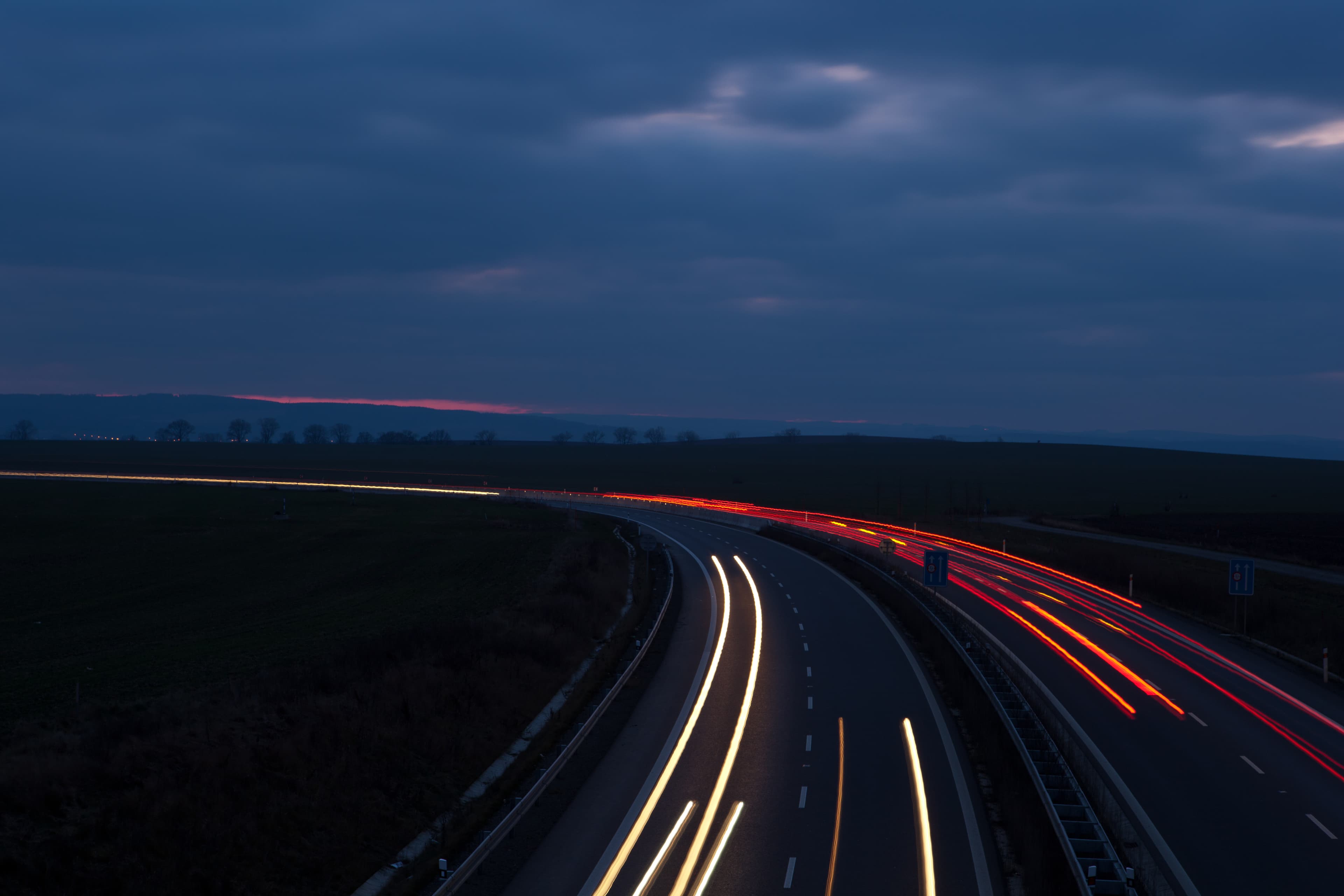 Cars racing on highway